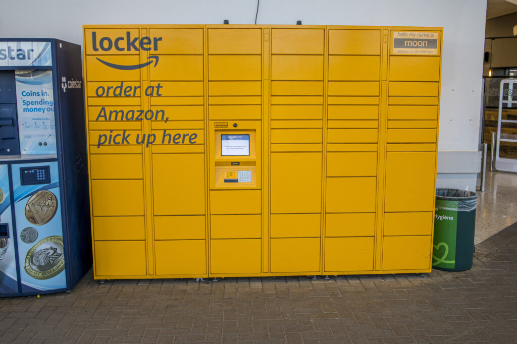 Bristol, England UK - February 14 2023: Amazon yellow online order pick up storage unit..