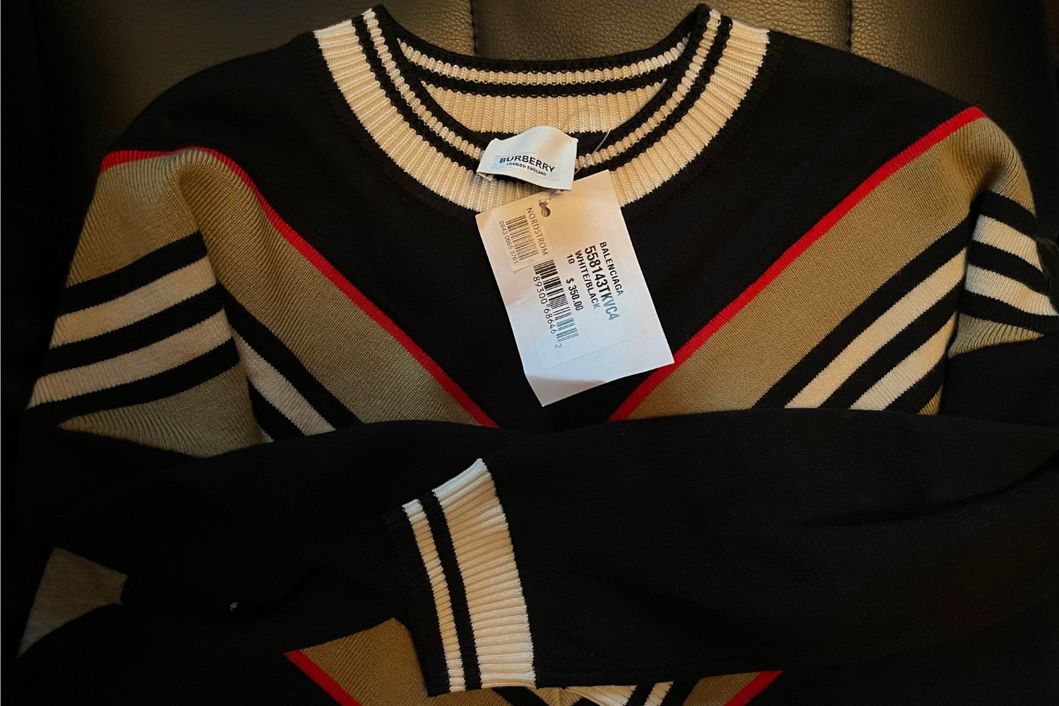 Nordstrom bar code sticker on Balenenciga hang tag (it's obviously a Burberry sweater, so liquidation includes error-marked items)