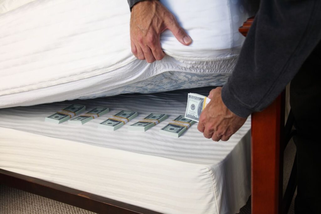 Stashing cash under mattress