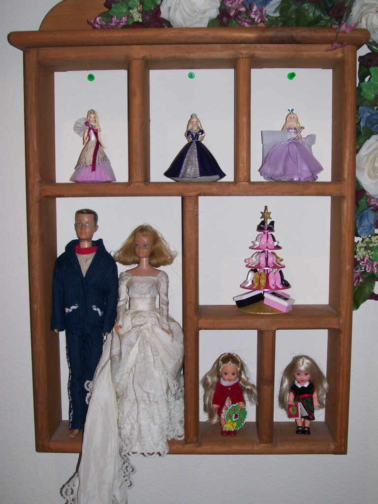 Vintage Ken doll and vintage Midge doll in homemade doll clothing
