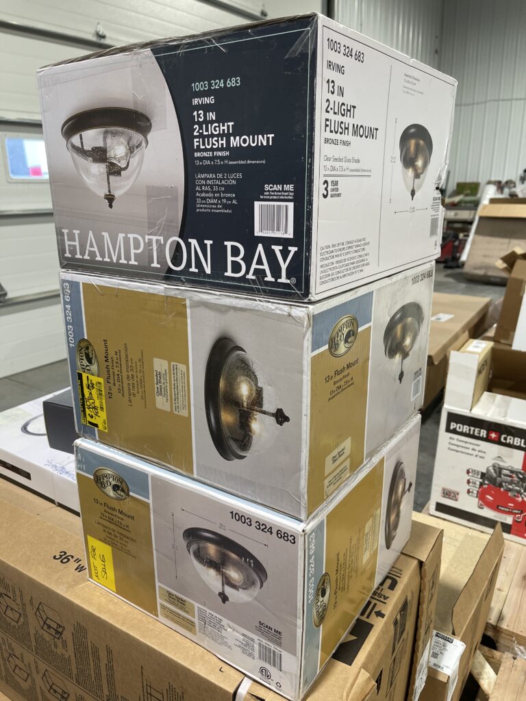 Hampton Bay light fixtures on a Home Depot liquidation pallet