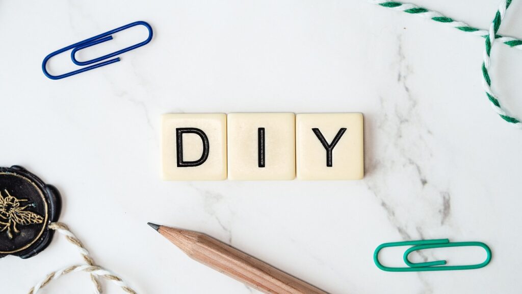 white cubes spelling out “DIY”