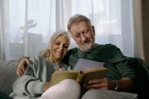 a retired couple sitting together