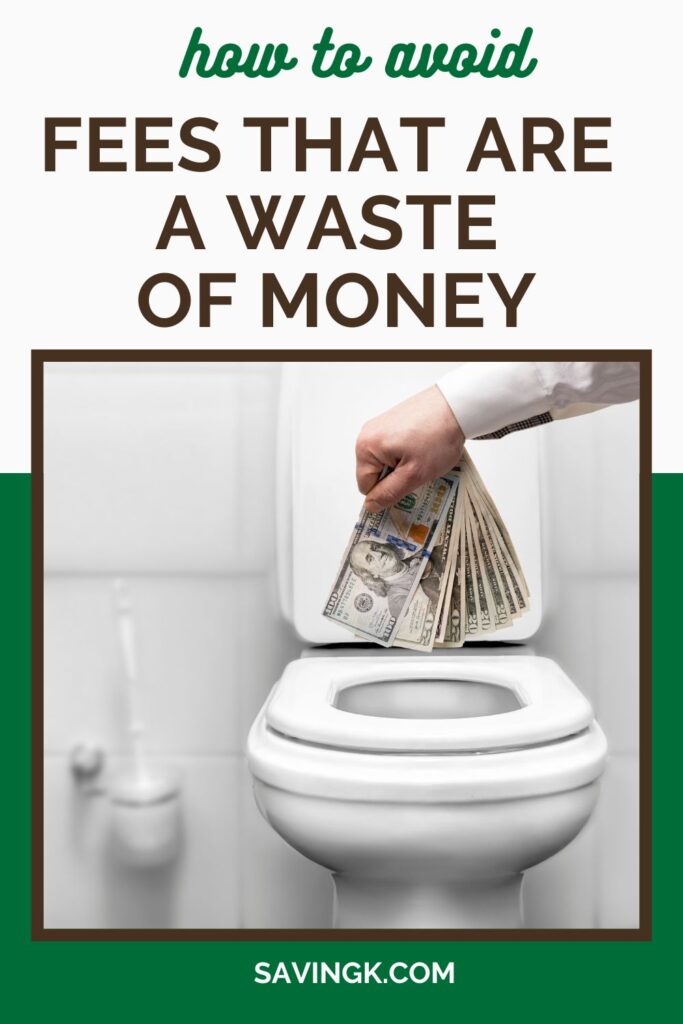 A hand holding a stack of cash over a toilet, symbolizing wasting money on unnecessary fees.