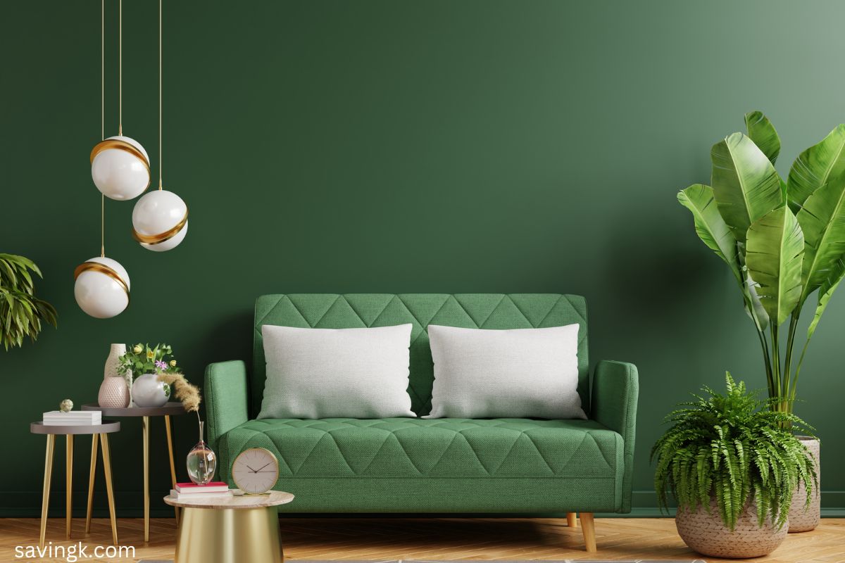 Stylish green living room with houseplants and gold accents, symbolizing growth, renewal, and financial abundance.