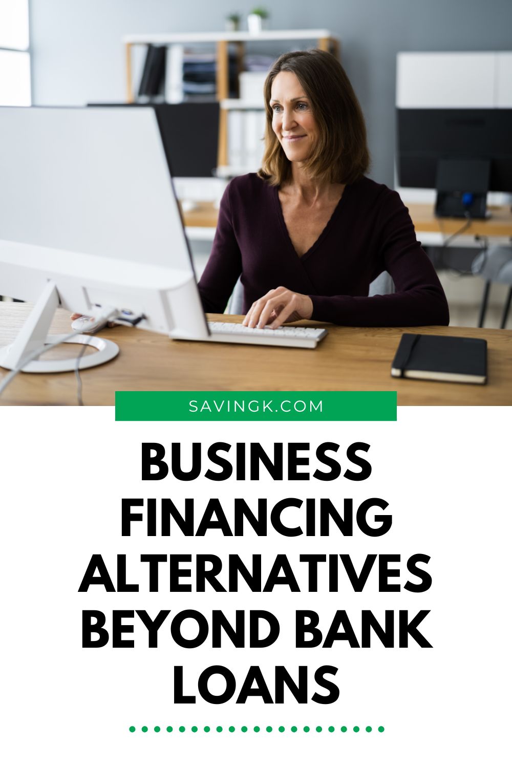Professional woman working at her computer with text overlay “Business Financing Alternatives Beyond Bank Loans.”