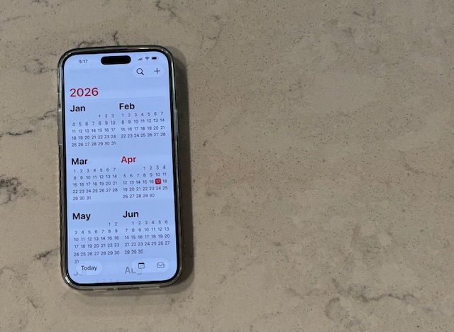 Smartphone displaying a 2026 calendar, representing planning and timing for seasonal reselling