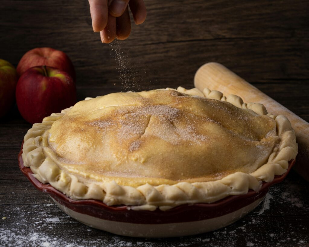 Homemade pie inspired by Depression-era dessert recipes with cinnamon sugar sprinkled on top