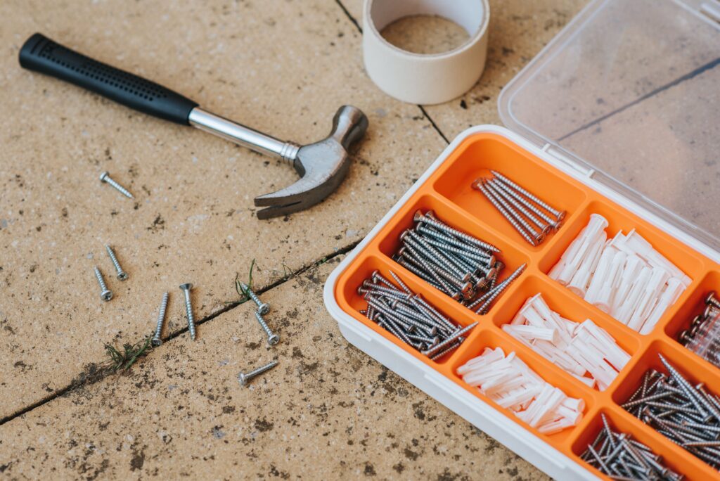 a toolbox next to a hammer