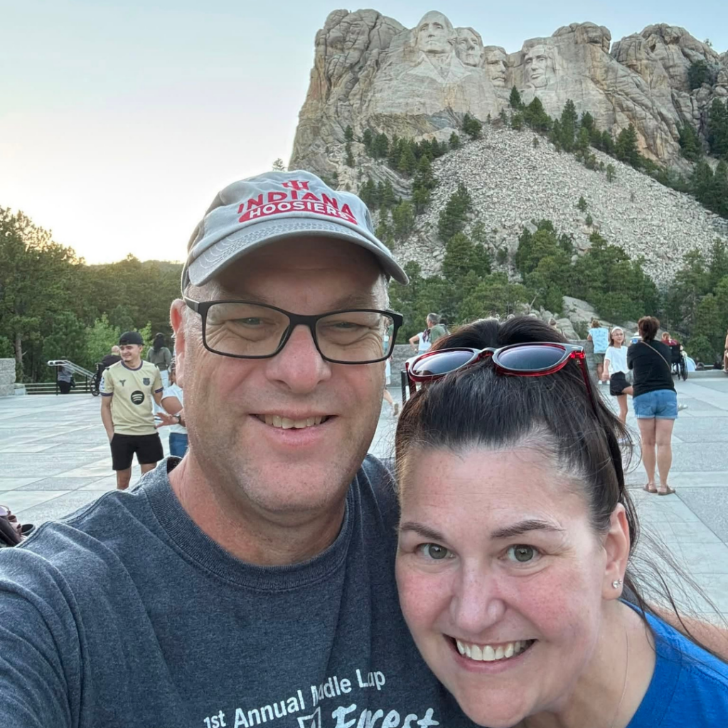Couple visiting Mount Rushmore National Memorial in the Black Hills of South Dakota